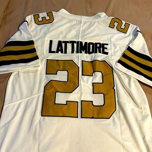 New Orleans Saints Lattimore jersey with Tom Benson memorial patch.